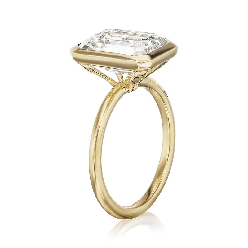 Elegant Emerald Cut Sterling Silver Bezel Engagement Ring In Golden Tone