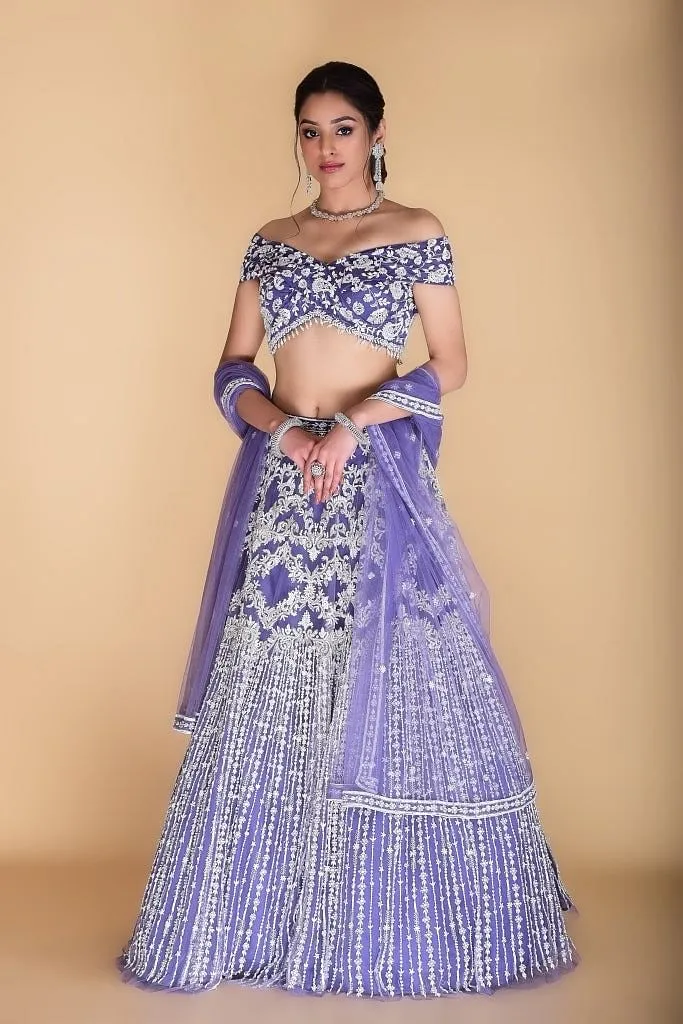 Light violet embroidered Lehenga set.