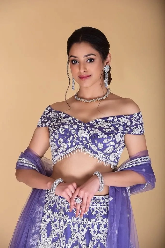 Light violet embroidered Lehenga set.