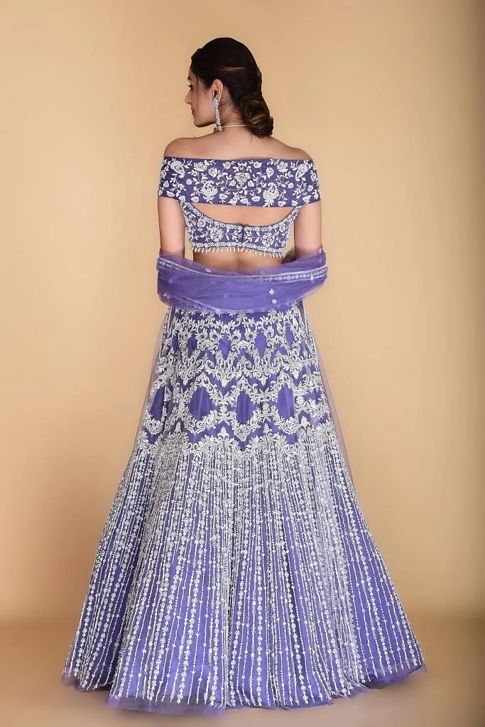 Light violet embroidered Lehenga set.