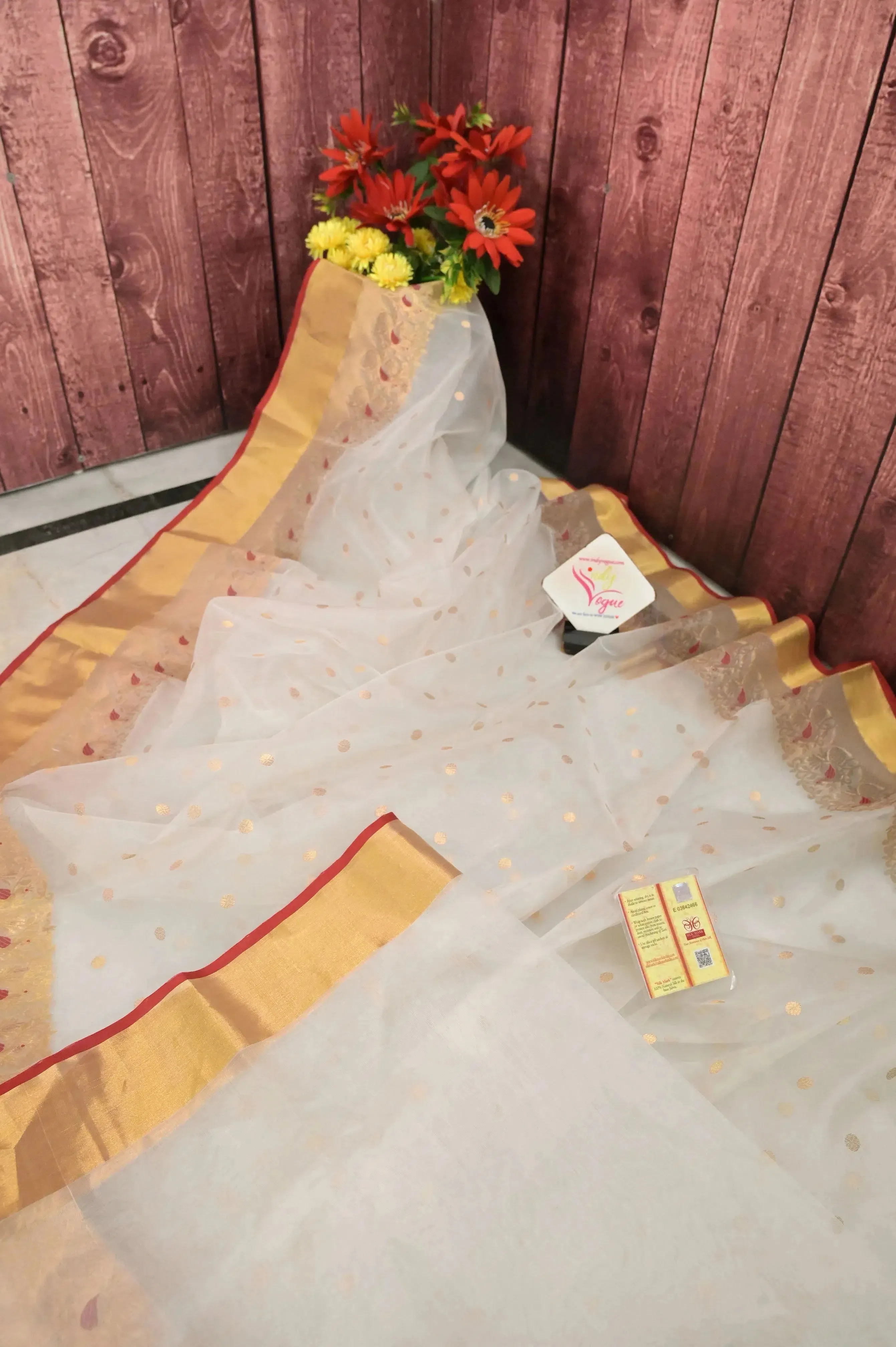 Offwhite Color Chanderi Silk Saree with Meenakari Border and Golden Buti Work